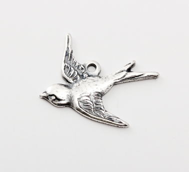Packet of west facing bird charms 